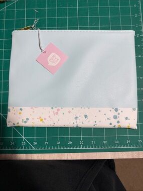 Light Blue and White Travel Pouch with Splash Accent